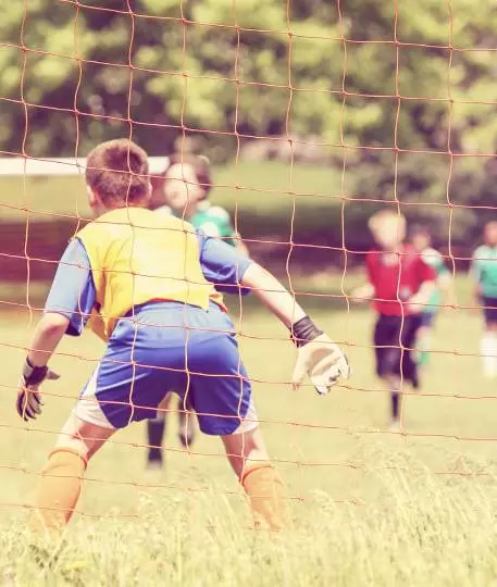 Boy guarding goal