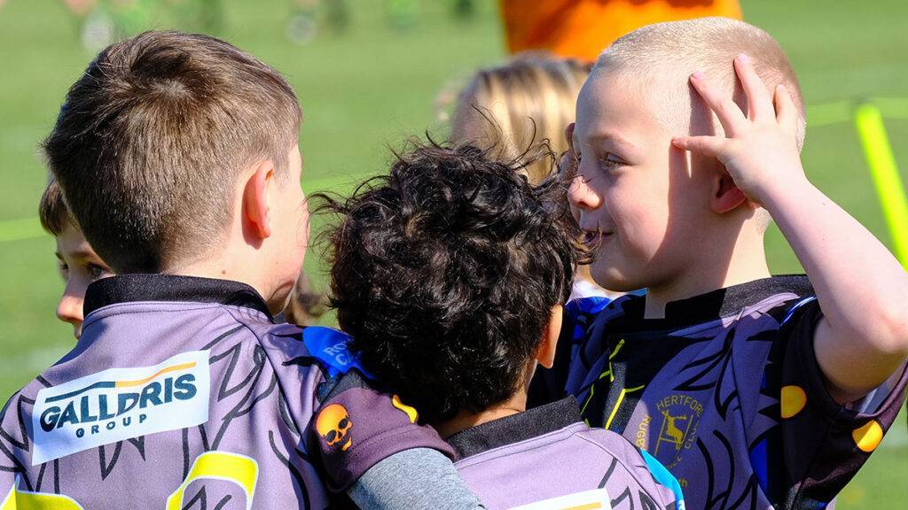 Boy rugby players celebrate