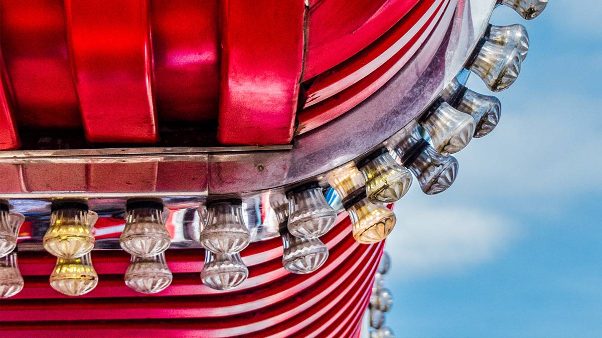 Lights and metal surround of a fairground ride