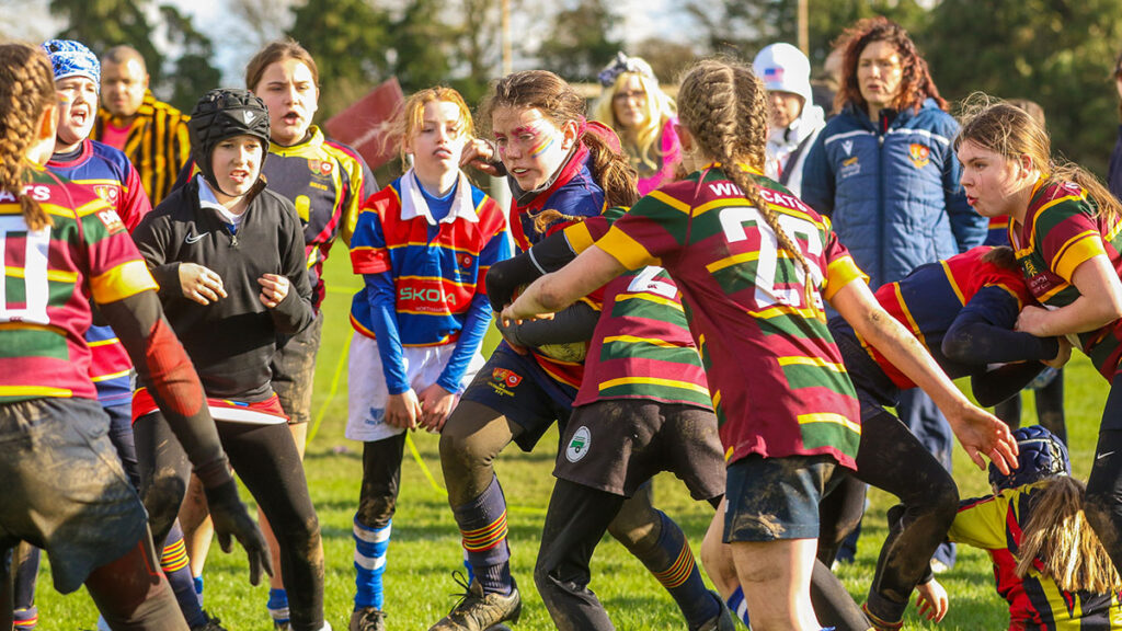 Girls rugby players competing at a tournament