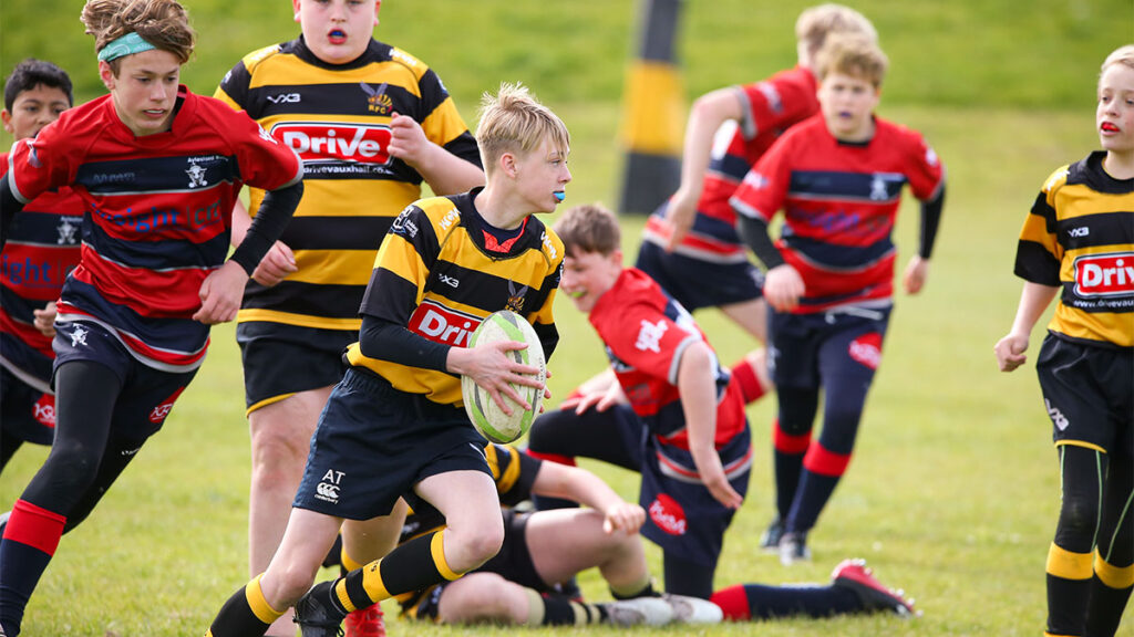 Young rugby players competing at a UK rugby festival