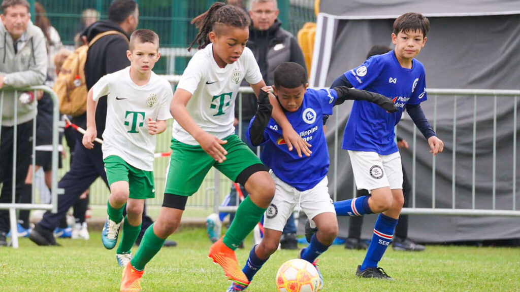 Two young footballers battling it out at the Dutch Soccer Cup
