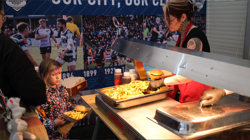 Serving food at Heidelberg Materials fun day