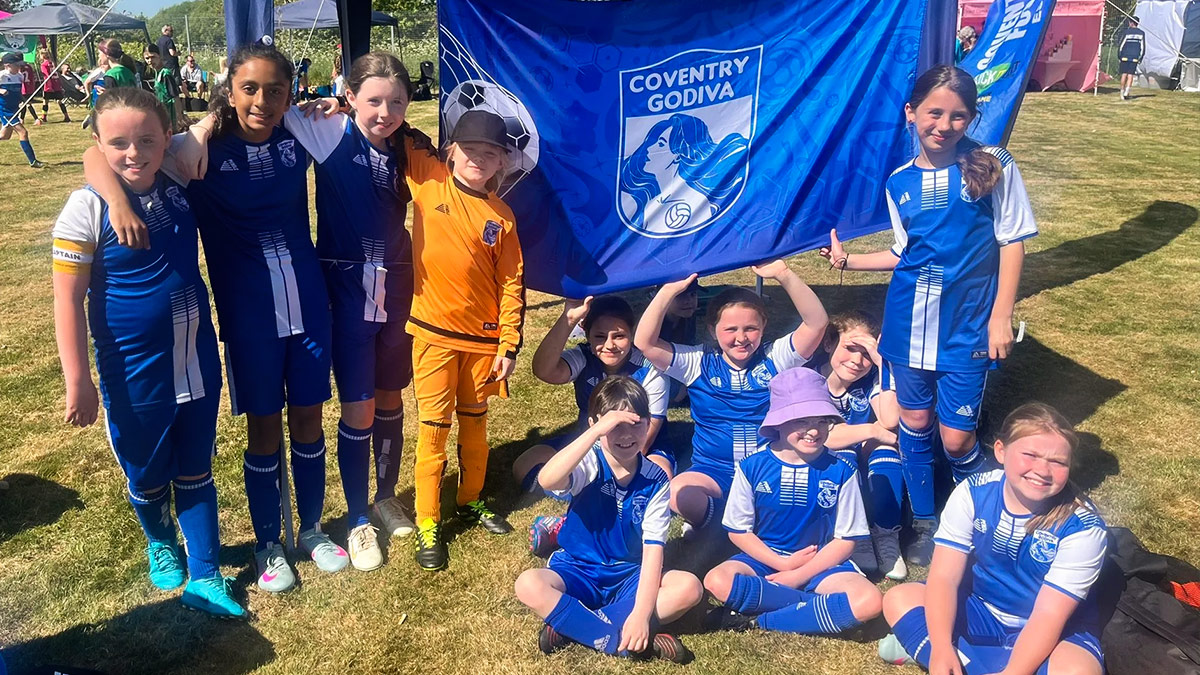 Coventry Godiva youth girls team posing in their team tent