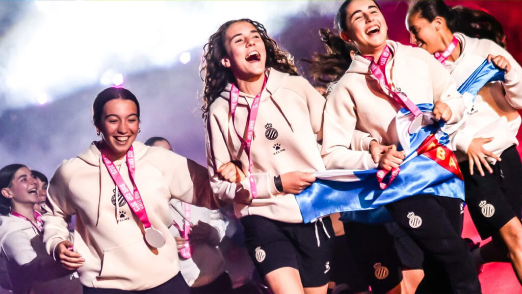 A young girls team having fun at an opening ceremony at the SWIT cup