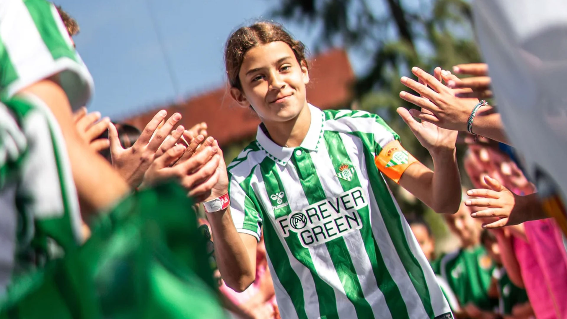A young girl footballer celebrating at SWIT cup