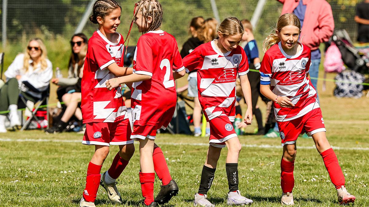 Girls playing football at a UK tournament
