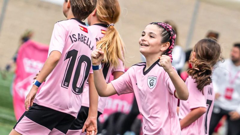 A young girl footballer celebrating at SWIT cup